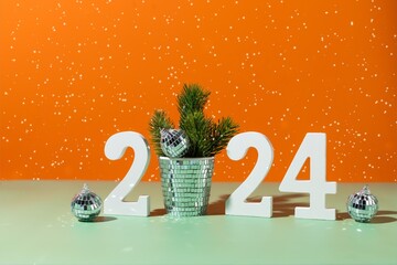 Banner with 2024 numbers and coffee cup.  New year’s background for coffee