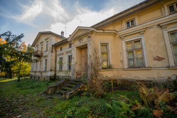 Fototapeta na wymiar A Journey and Exploration of Abandoned Old Historic Mansions Palace in Poland in Europe