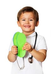 smiling child doctor and stethoscope and orthopedic insole on white background