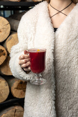 hot mulled wine in female hands