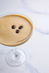 Alcoholic cocktail with coffee beans 