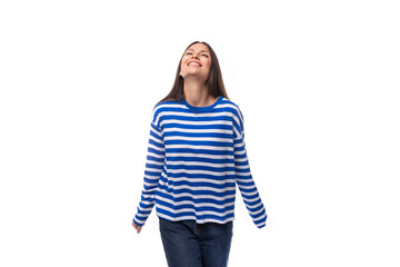 pretty slender brunette with straight hair is dressed in blue striped sailor clothes