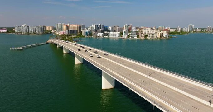 Florida travel destination. Sarasota city downtown with Ringling Bridge and expensive waterfront high-rise buildings