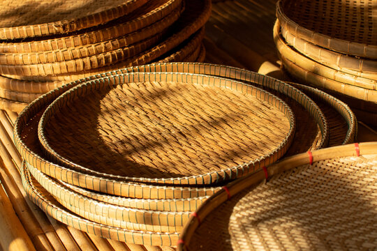 Basketry equipment made from bamboo such as sticky rice containers, food steamers, animal trapping equipment, baskets, hats.
