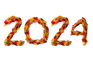 Calendar header number 2024 made from multi-colored jelly beans on a white background. Happy New Year 2024 colorful background.