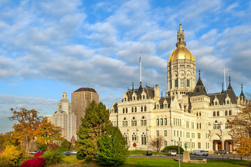 State capitol building houses State Senate and the House of Representatives, in Victorian Gothic...