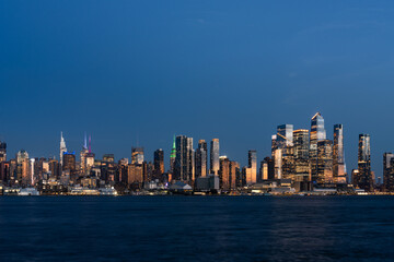 New York Manhattan west side skyline at night, panoramic view on skyscrapers