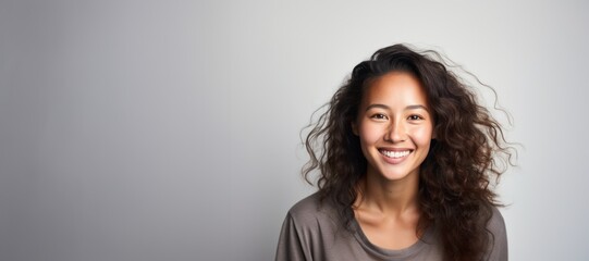 Young Asian biracial woman smiling happy face portrait