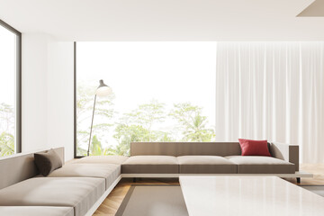 White hotel living room interior with couch and coffee table, panoramic window