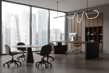 Gray CEO office corner with bookcase