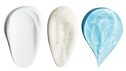 Smears of a beautiful transparent thick blue gel, cream and cream with gold flakes on an empty background.