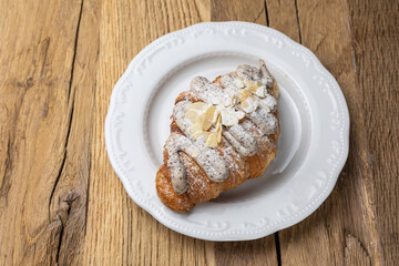 Delicious croissant on a plate