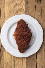 Delicious croissant on a plate