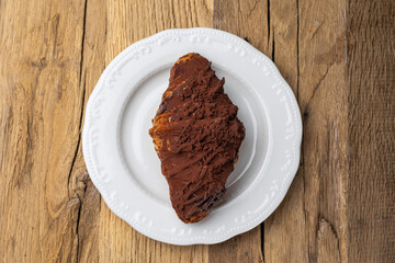 Delicious croissant on a plate