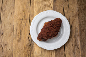 Delicious croissant on a plate
