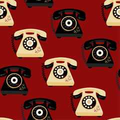 Seamless pattern of retro phones on a red background.