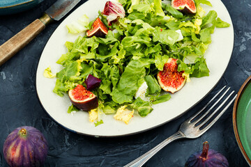 Homemade fruit salad bowl with figs.
