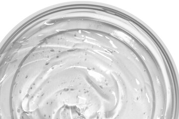 Transparent cosmetic gel in a round jar. View from above. On an empty background.