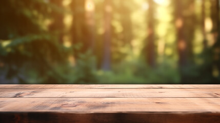 The empty wooden table top with blur background of forest . Exuberant image. soft focus background. copy space.
