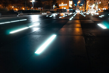 Fototapeta na wymiar futuristic city street light on ground, luminescence or neon glow, Warsaw