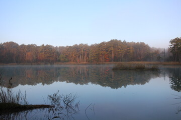 Early morning scenery of Bentennuma pond and autumn leaves in Goshikinuma, Urabandai, Fukushima, Japan