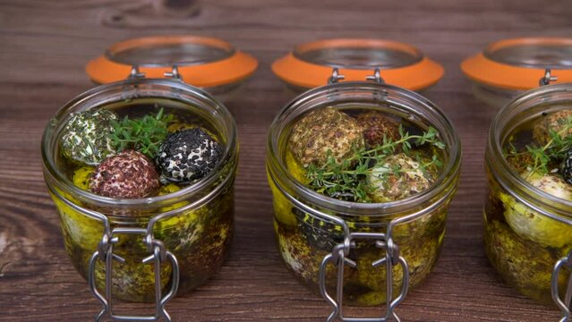 RECIPE FOR LABNEH CHEESE BOLLS WITH DRY MINT, BLACK AND WHITE SESAME, SUMAC AND ZAATAR IN A JAR WITH OLIVE OIL. High quality photo
