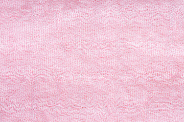 Close-up detail of pink fabric, macro, Fabric texture of natural cotton or linen textile material....