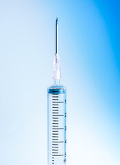 macro syringe,A 5ml syringe and needle isolated on a white background with detailed clipping path,Close up of a syringe. Focus on numbers.