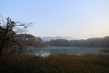 Early morning scenery of Bentennuma pond and autumn leaves in Goshikinuma, Urabandai, Fukushima, Japan