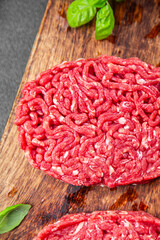 cutlet raw meat beef burger eating cooking appetizer meal food snack on the table copy space food background rustic top view