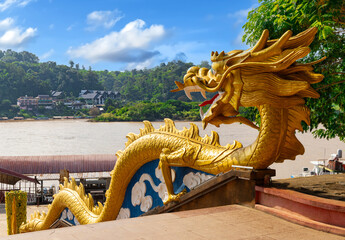Golden Dragon with wide open mouth wrapped down the Stairs at the Golden Triangle on the Laos Side...