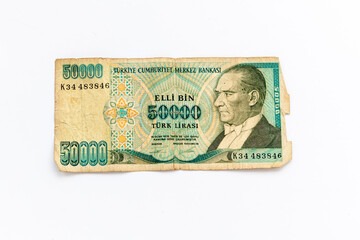 The front of an old Turkish fifty thousand lira bank note.
