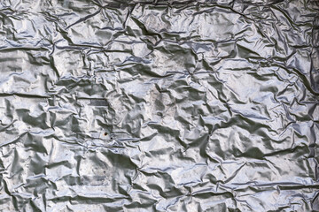 crumpled thick aluminum foil wall insulation surface texture and background