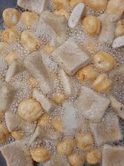 Fried meatballs in boiling oil.