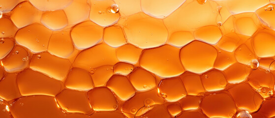 Detailed honeycomb texture, rich orange liquid in cells.