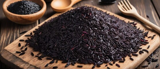 Pile of black rice on wooden planks table from Generative AI