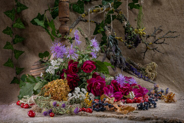 Breath of autumn. Ikebana of autumn flowers, fruits, leaves.