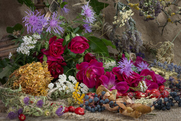 Breath of autumn. Ikebana of autumn flowers, fruits, leaves.