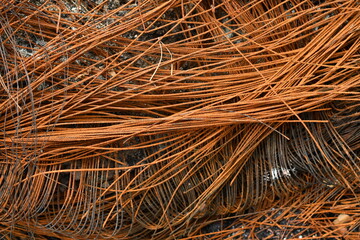 Background of burned car tire cords.