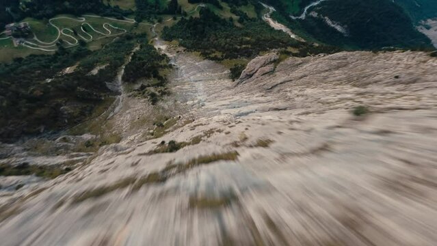 Fpv drone diving the Mattenberg in Grindelwald Switzerland fast pace cinematic drone flying, flying like a bird