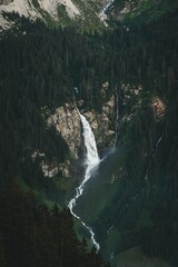 Beautiful closeup of a waterfall  streaming through the mountain cliff