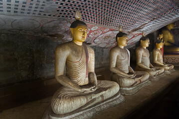 5th Century Dambulla Cave Temple Statues In Dambulla, Sri Lanka. Dambulla Cave Temple Is The Largest And Best Preserved Cave Temple Complex In Sri Lanka