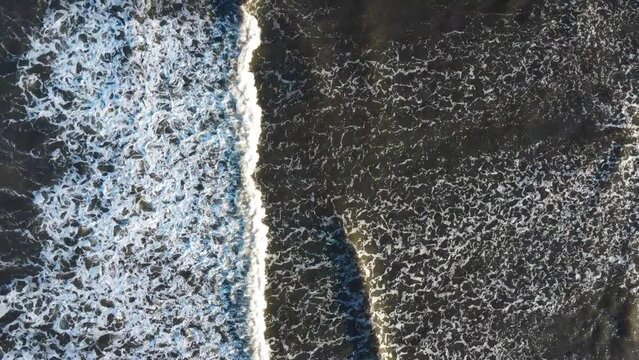 Drone shot of some Waves, taken directly from above