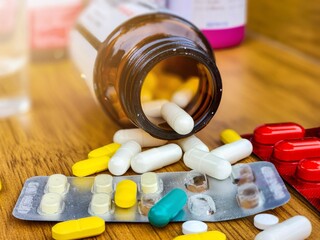 Colorful medication and pills. Close-up of Capsule. Heap of pills. Pills and tablets as Medical...