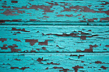 Old blue wooden wall with peeling paint. Abstract background for design.