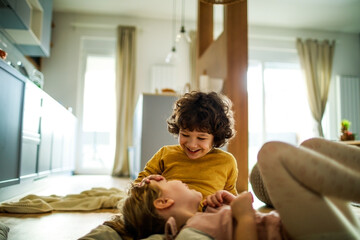 Cute little children playing in living room