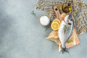 Raw dorado fish with spices cooking, Restaurant menu, dieting, cookbook recipe top view