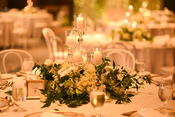 Close up of wedding table decorations with candles