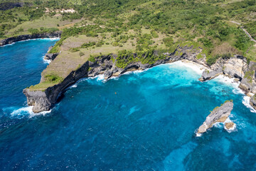 Drone view of Dolphin Bay and Korawa Beach on sunny day. Nusa Penida, Indonesia.