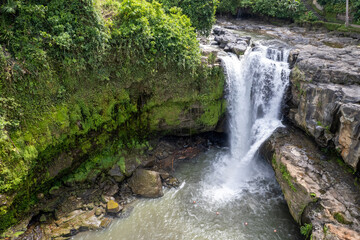 Drone view of Tegenungan Waterfall on sunny day. Bali, Indonesia.